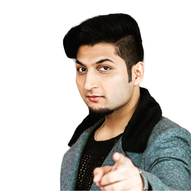 Bilal Saeed wearing a grey jacket and pointing.