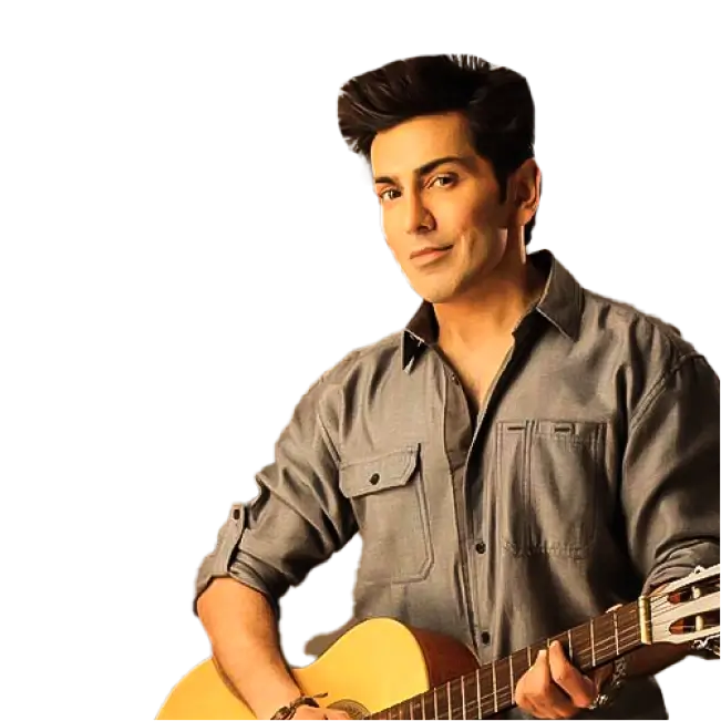 Faakhir Mehmood, wearing a grey shirt, holding a guitar, and smiling slightly.