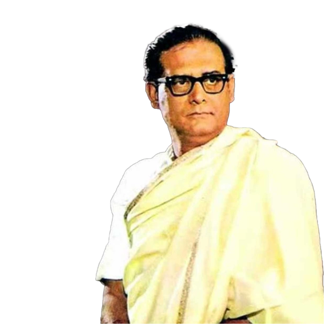 Hemant Kumar wearing traditional attire, looking serious with glasses.