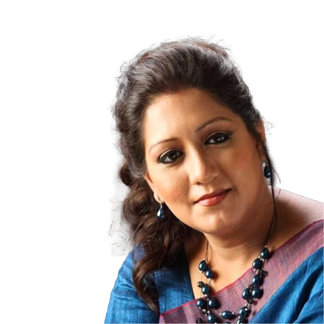 Jayati Chakraborty wearing a blue saree with a matching necklace and earrings, with her hair tied back.