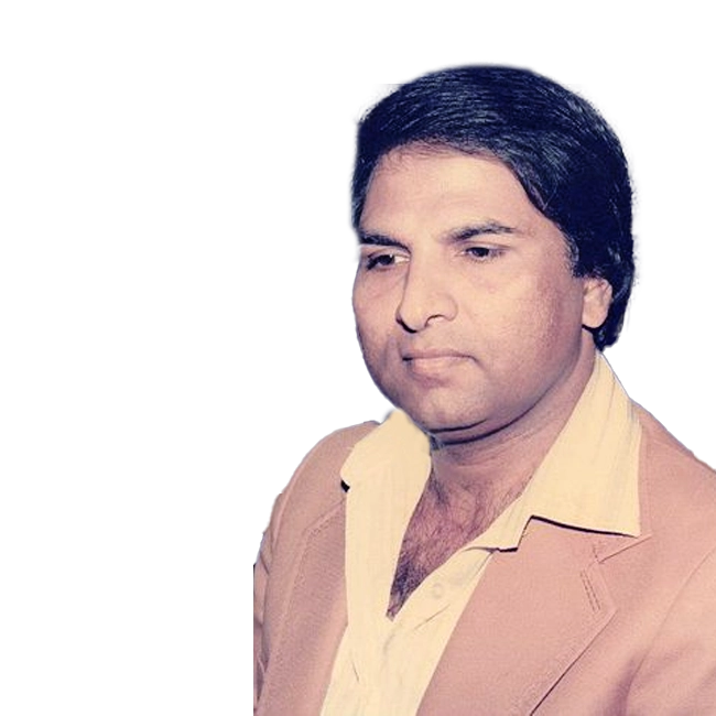 Akhlaq Ahmed wearing a light-colored shirt and a tan blazer
